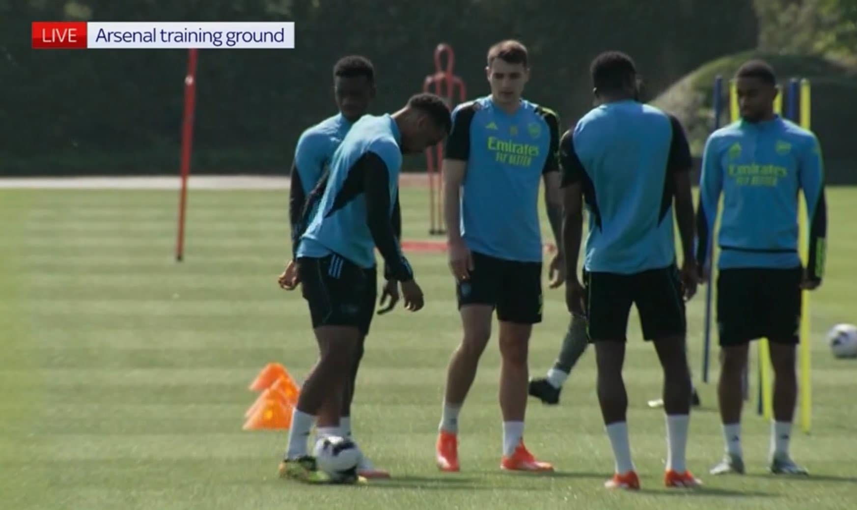 May be an image of 4 people, people playing American football, people playing football, studded shoes and text that says "LIVE Arsenal Arsenaltrainingground training ground"