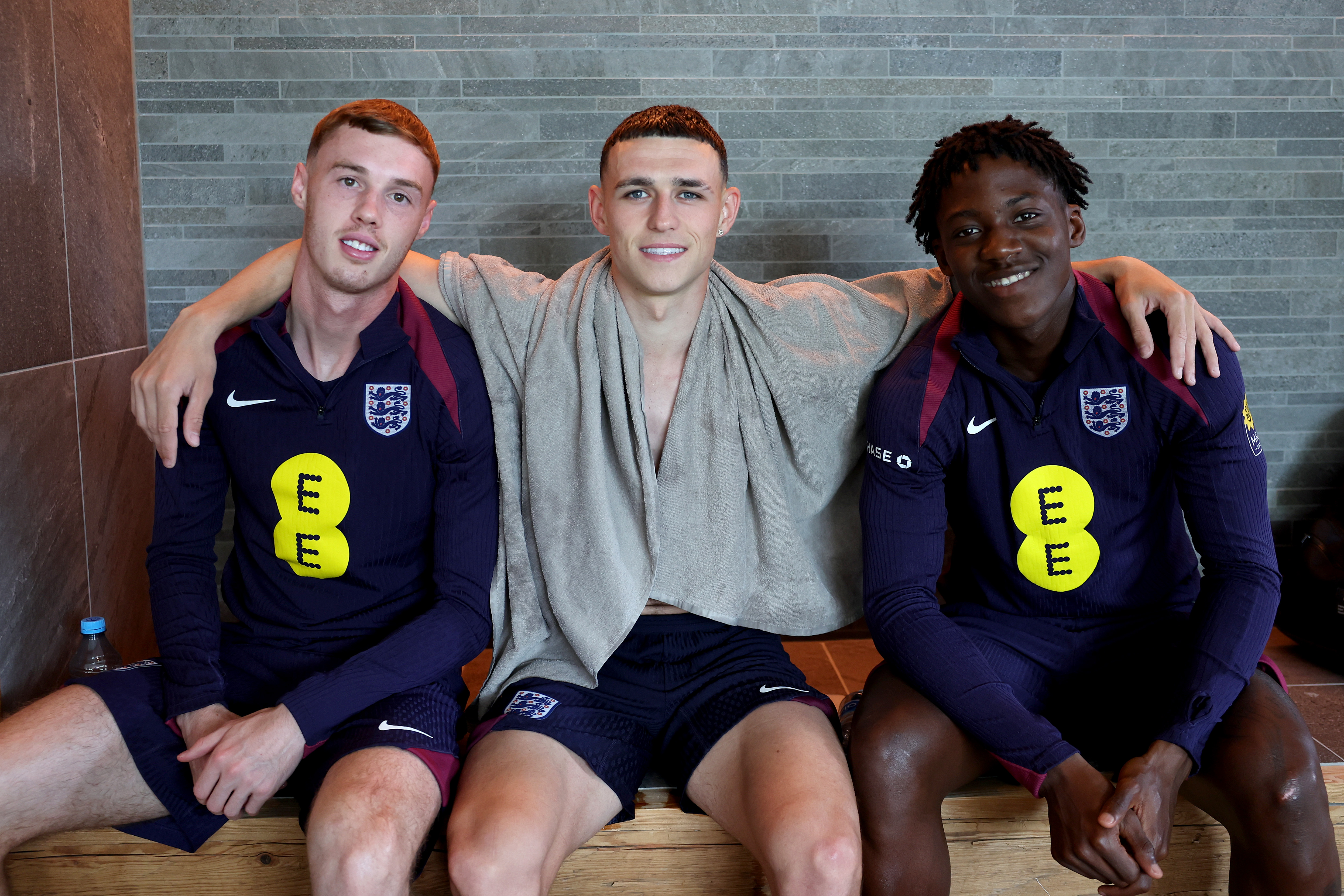 Cole Palmer, Phil Foden and Kobbie Mainoo smile for the camera in Blankenhain